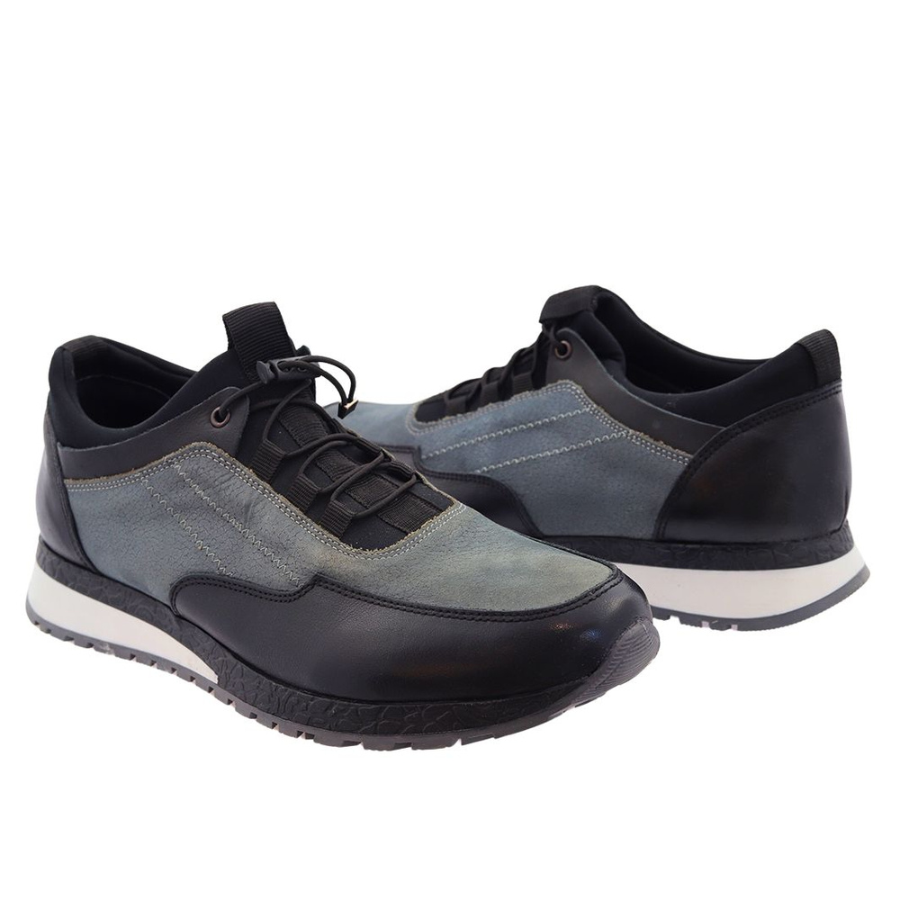 Сірі чоловічі спортивні туфлі на шнурівці