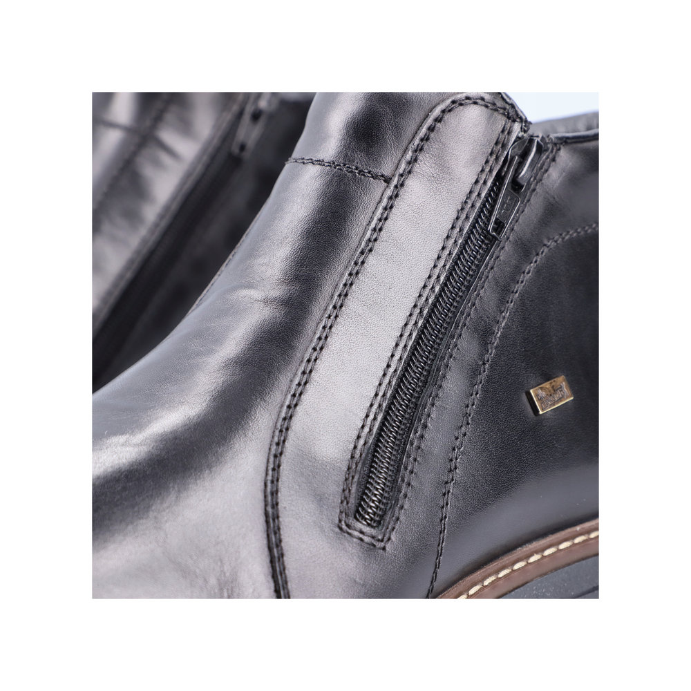 Чорні шкіряні ботильйони Rieker 33160-00