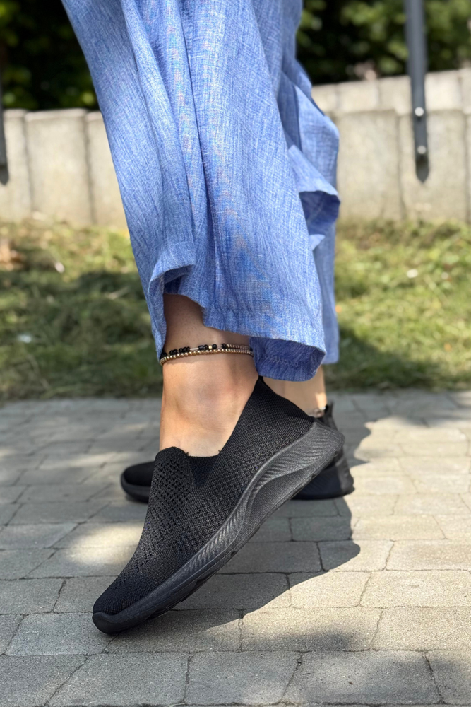 Білі ажурні шкіряні босоніжки на танкетці Filippo