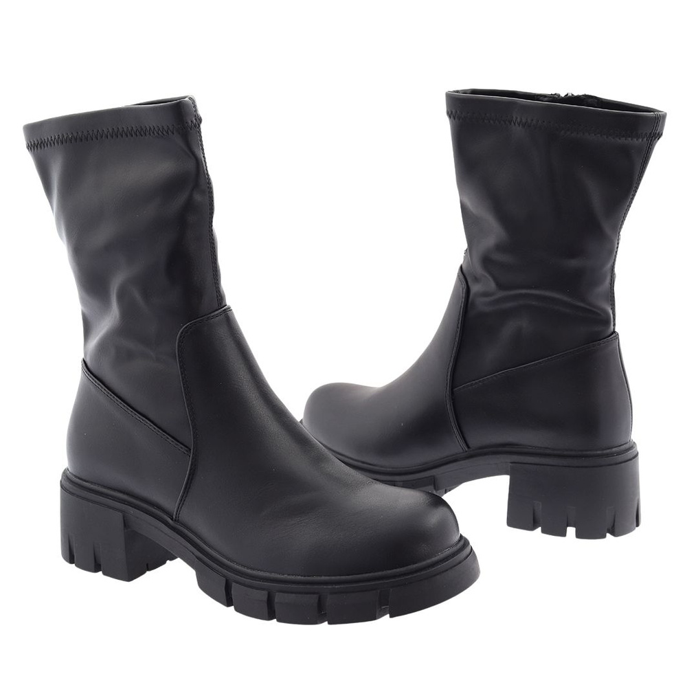 Чорні високі ботильйони на платформі