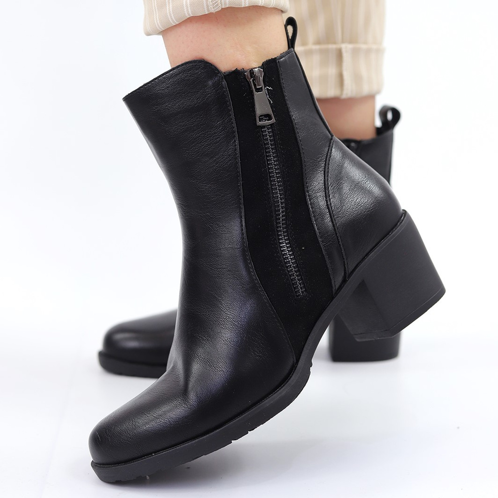 Жіночі чорні утеплені ботильйони M. Daszyński