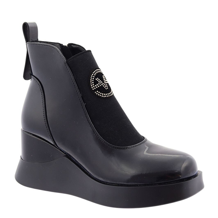 Чорні шкіряні ботильйони на платформі з танкеткою