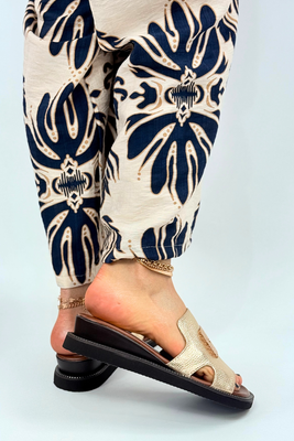 Золоті сліпони на гумці