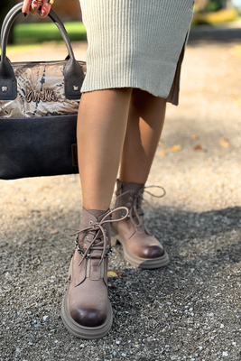 Skórzane trapery brązowe ocieplane praktyczne i wygodne