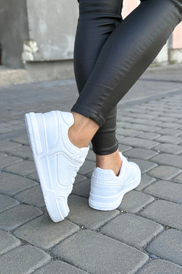 Damskie białe sneakersy Big Star z ekoskóry na płaskiej podeszwie