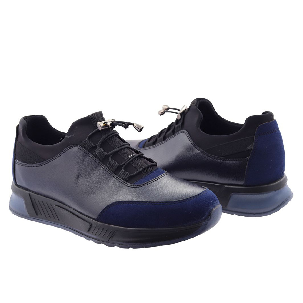 Чоловіче спортивне взуття з екошкіри темно-синього кольору