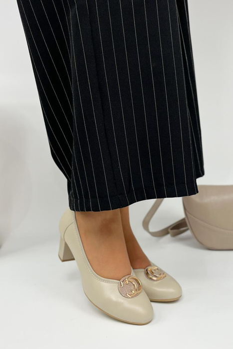 Бежеві шкіряні сліпони на високих підборах