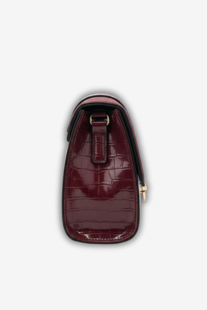 Mała lakierowana torebka z motywem skóry węża bordowa
