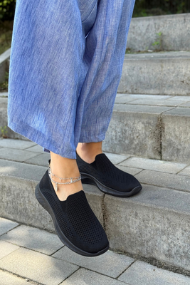 Білі ажурні шкіряні босоніжки на танкетці Filippo