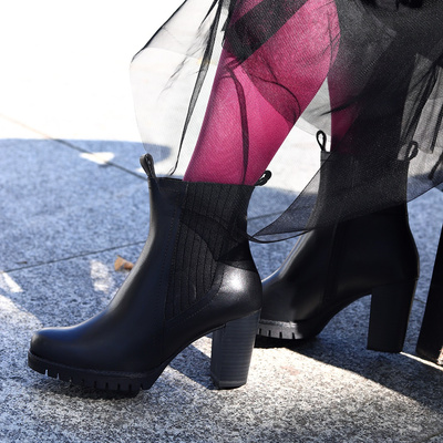 Чорні високі шкіряні черевики Marco Tozzi