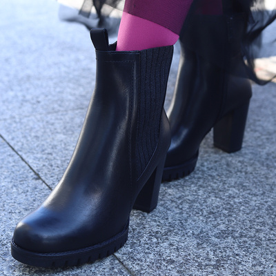 Чорні високі шкіряні черевики Marco Tozzi