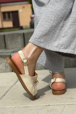 Złote skórzane sandały zabudowane płaskie 