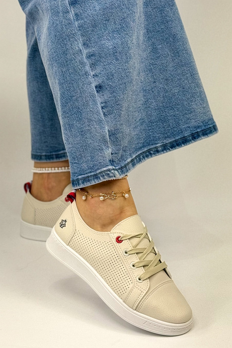 Бежеві перфоровані спортивні туфлі на шнурівці