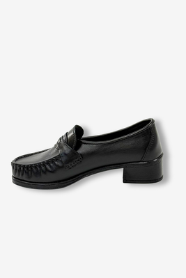 Чорні жіночі шкіряні ботильйони Ajas на танкетці