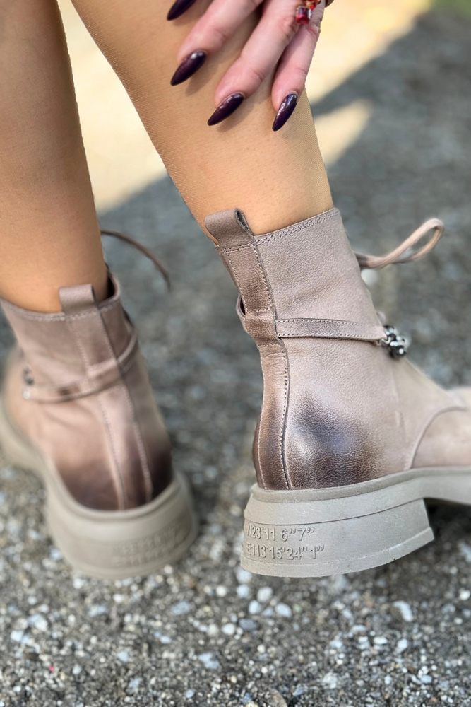 Skórzane trapery brązowe ocieplane praktyczne i wygodne