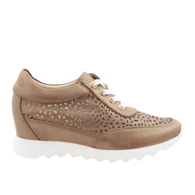 Жіночі золотисті ажурні кросівки на закритій танкетці