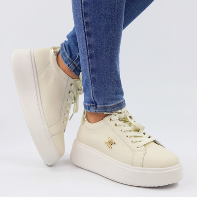 Бежеві шкіряні кросівки з золотими вставками на платформі Potocki