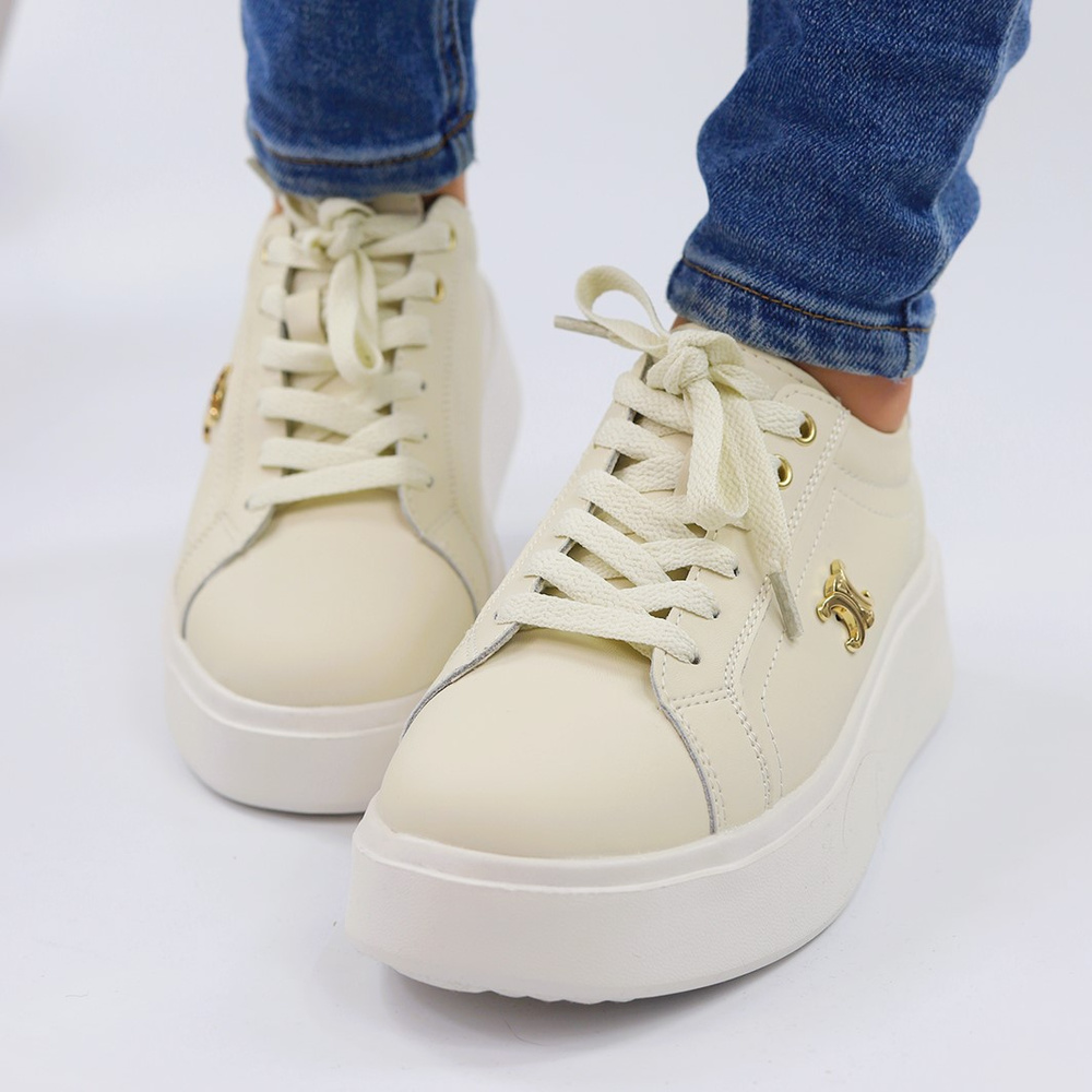 Бежеві шкіряні кросівки з золотими вставками на платформі Potocki