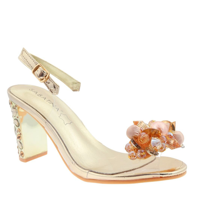 Piękne złote przezroczyste sandały damskie na słupku