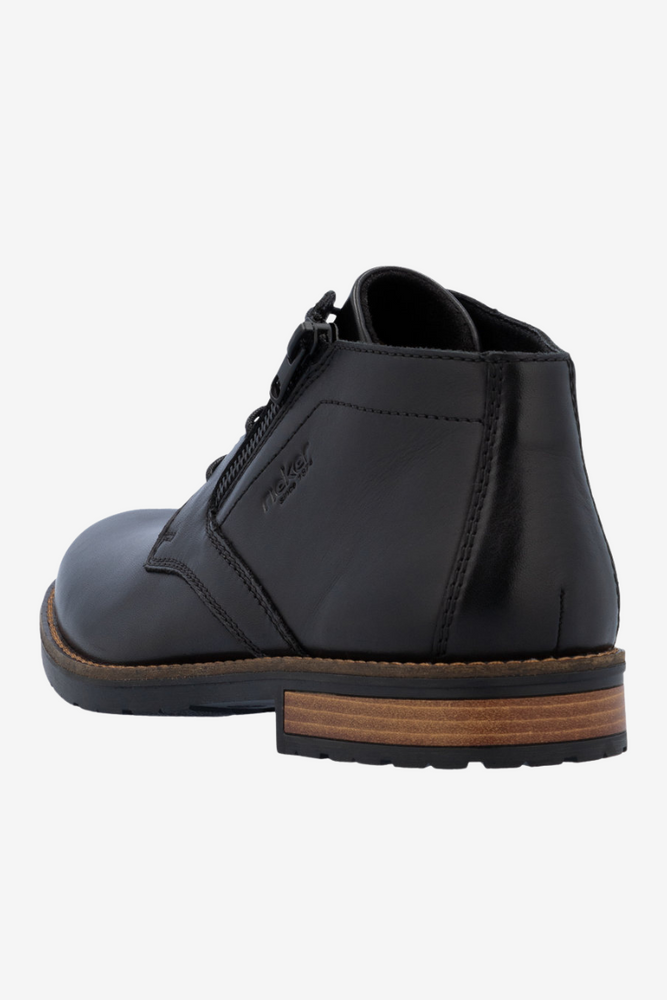 Чорні чоловічі шкіряні чоботи на платформі, утеплені Rieker