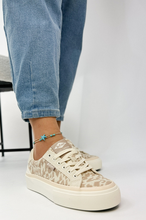 Жіночі кросівки бежевого кольору з нашивками, шнурівка на платформі