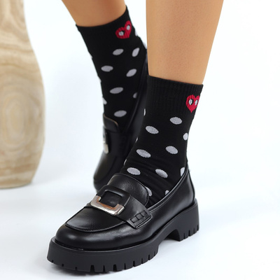 Чорні сліпони з пряжкою на платформі