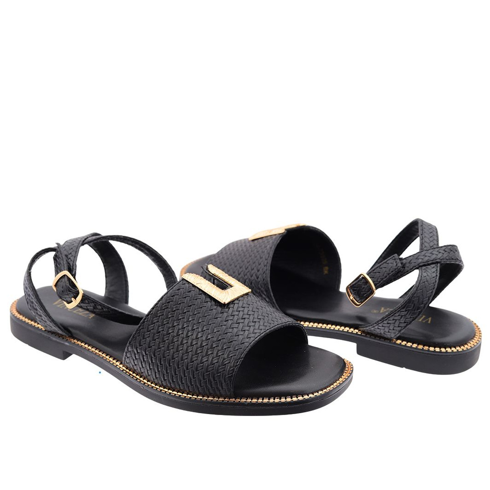 Чорні босоніжки на плоскій підошві з пряжкою Vinceza