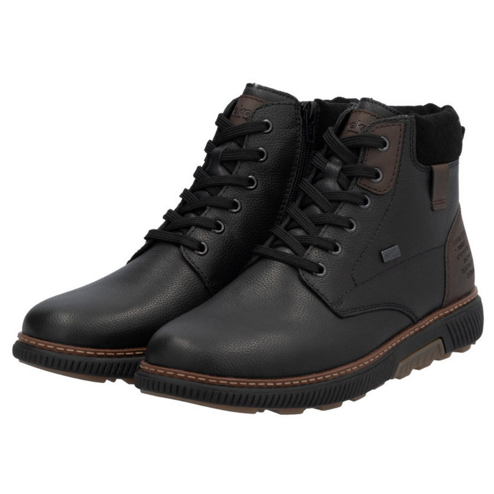 Чорні чоловічі шкіряні чоботи на платформі, утеплені Rieker 