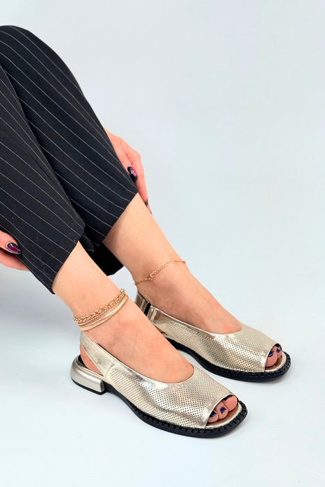 Золоті шкіряні босоніжки на високих підборах з перфорацією