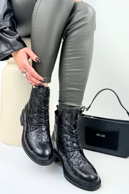 Чорні жіночі шкіряні ботильйони на товстій платформі зі шнурівкою 