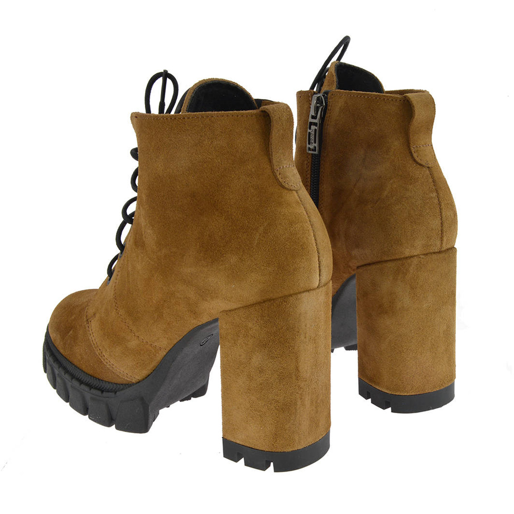 Жіночі шкіряні ботильйони на високих підборах