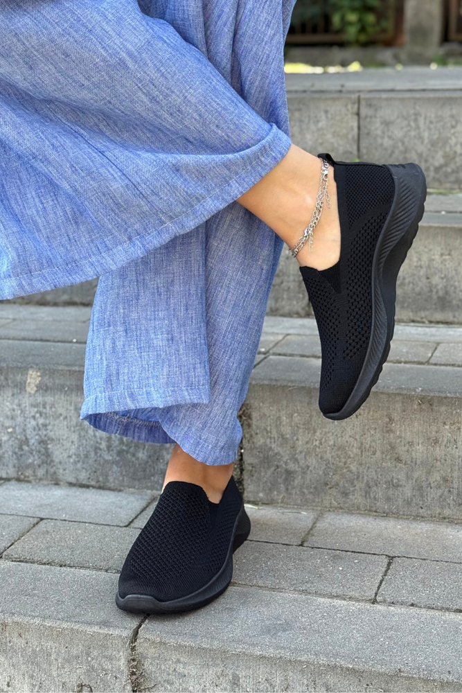 Білі ажурні шкіряні босоніжки на танкетці Filippo